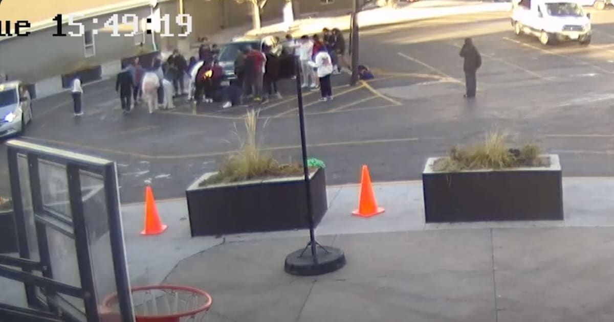 Some high school students got together to lift a vehicle and rescue a woman and her child who were trapped underneath the car (The Independent/YouTube)