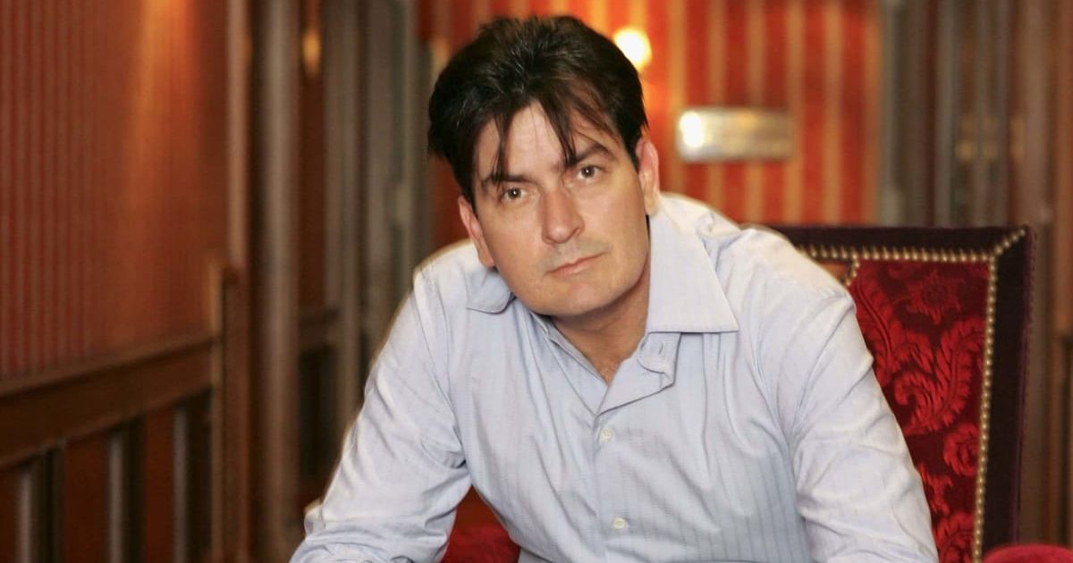Charlie Sheen's neighbor was arrested after she tried to strangle him and ripped his shirt in an assault following forced entry into his home (Getty Images)
