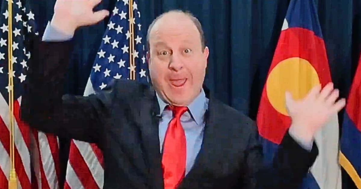 Colorado Governor Jared Polis faced harsh criticism for his 'Feliz Navidad' holiday message (X/@GovofCoEspanol)