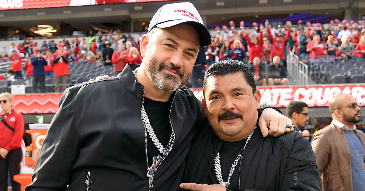 Jimmy Kimmel and his sidekick Guillermo Rodriguez pose for a photo before the start of the Jimmy Kimmel LA Bowl (Getty Images)