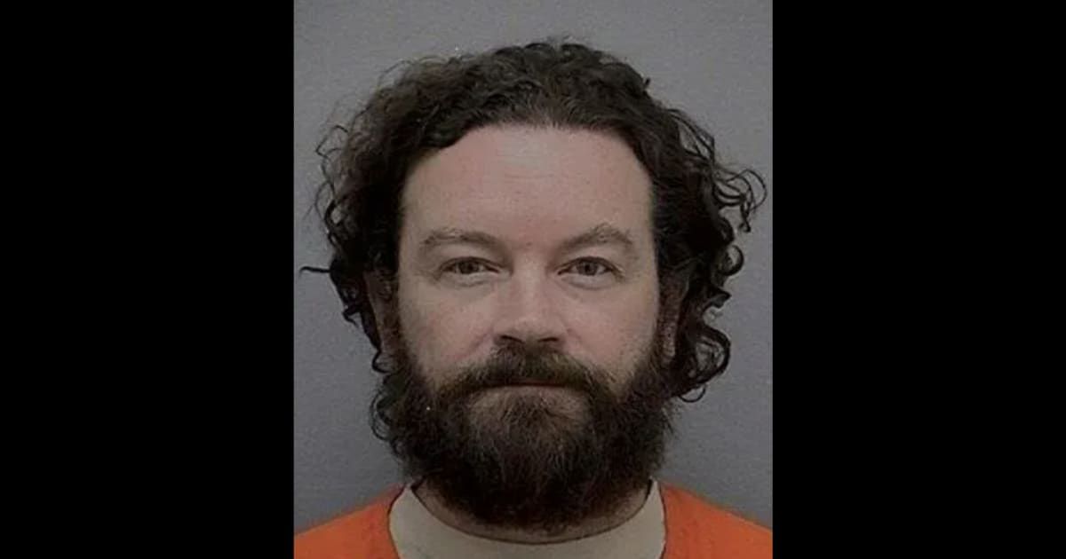'Giving Charlie Manson vibes': Danny Masterson's first mugshot goes viral as actor sent to state prison after rape conviction