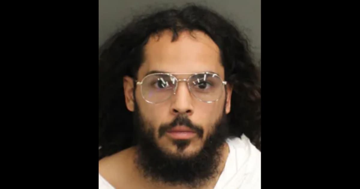 Nicholas Carrasquillo allegedly admitted that he shot once into the road and fired several more rounds (Orange County Jail)