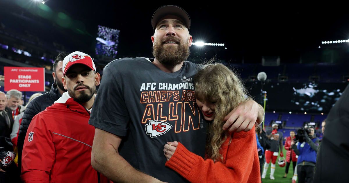The passionate embrace and romantic kisses between Travis and Swift showcased a love story that stole the spotlight after the intense game (Getty Images)
