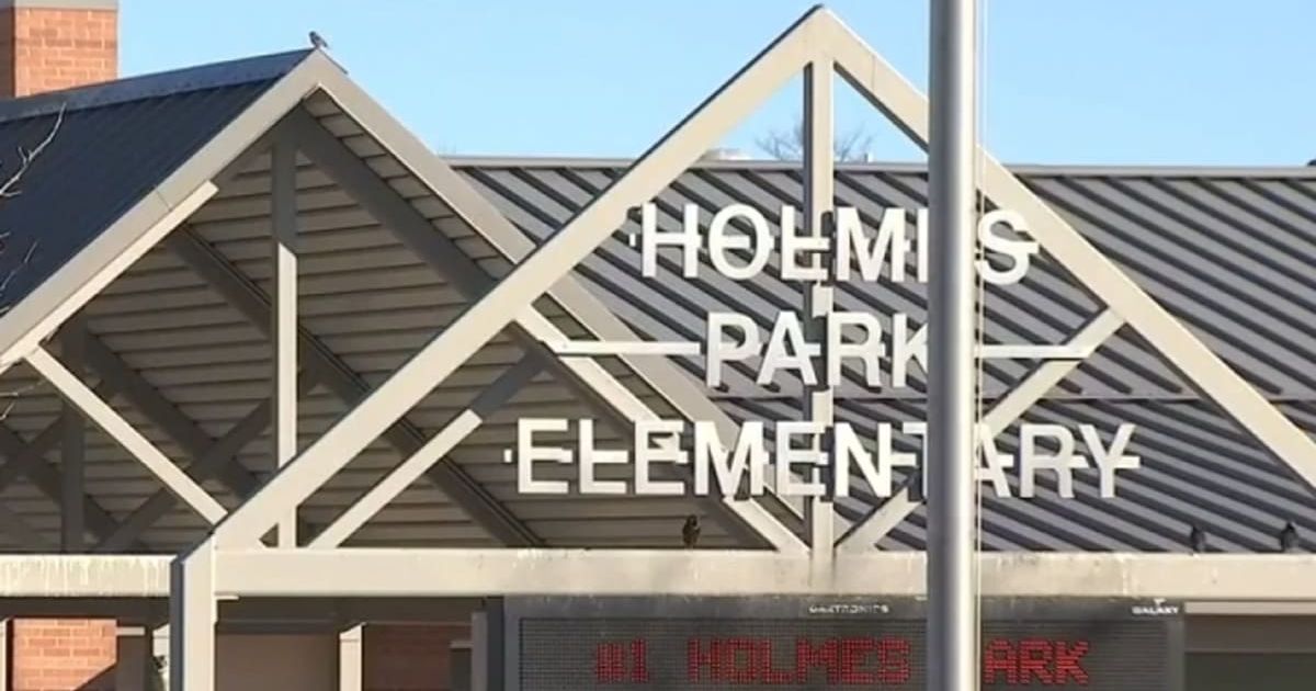 A 7-year-old was hospitalized after being struck by a car outside Holmes Park Elementary school (Fox 23/screengrab) 