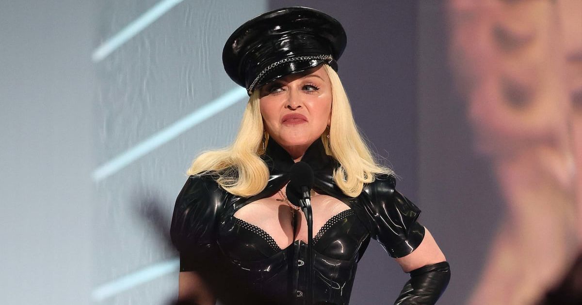 Madonna dubbed 'Britney #2' as she poses on all fours in red negligee ahead of Rock ‘n’ Roll Hall of Fame ceremony