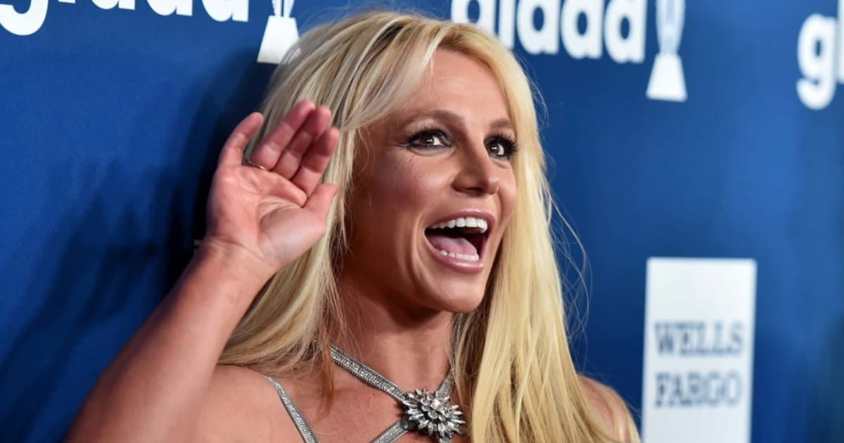 Britney Spears has posted provocative clips of herself energetically performing in revealing latex outfits and snacking on cherries (Getty Images)