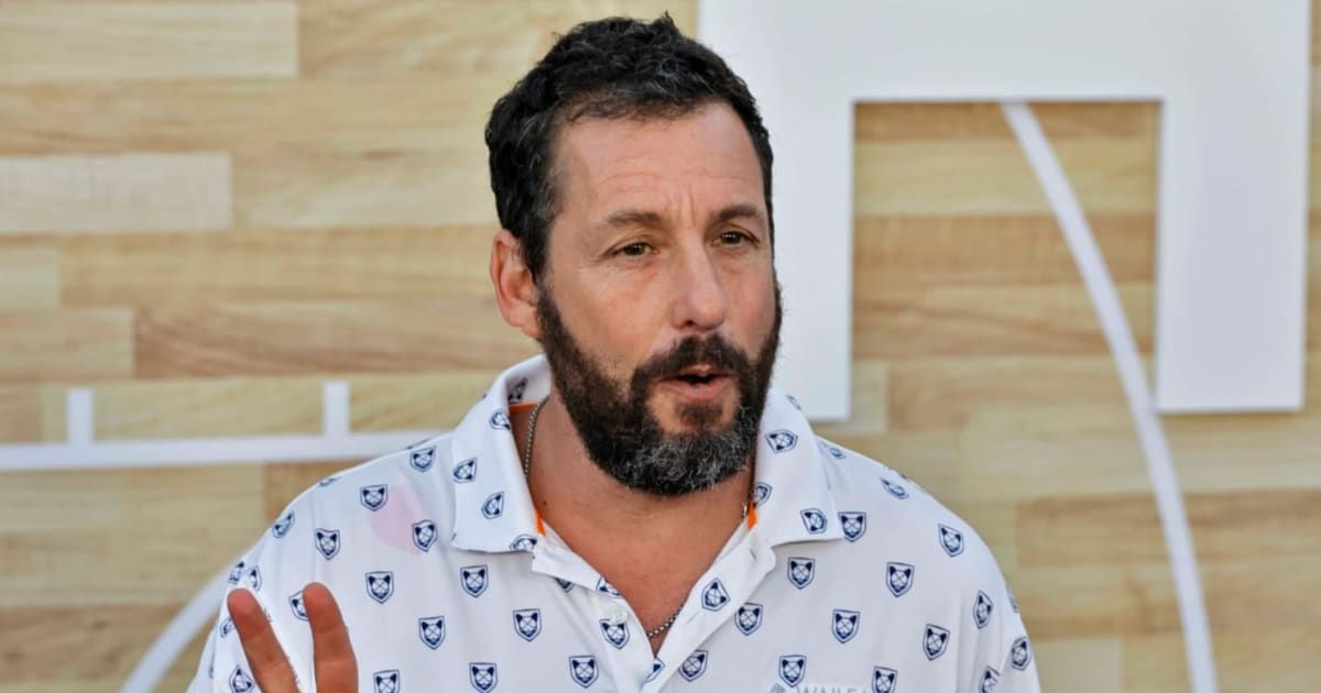 Adam Sandler made self-deprecating jokes about his body and manhood while accepting the People’s Icon Award (Getty Images)