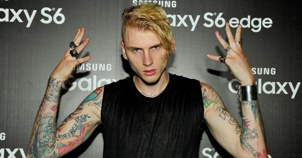 Machine Gun Kelly debuted an upper body blackout tattoo for spiritual reasons (Getty Images)
