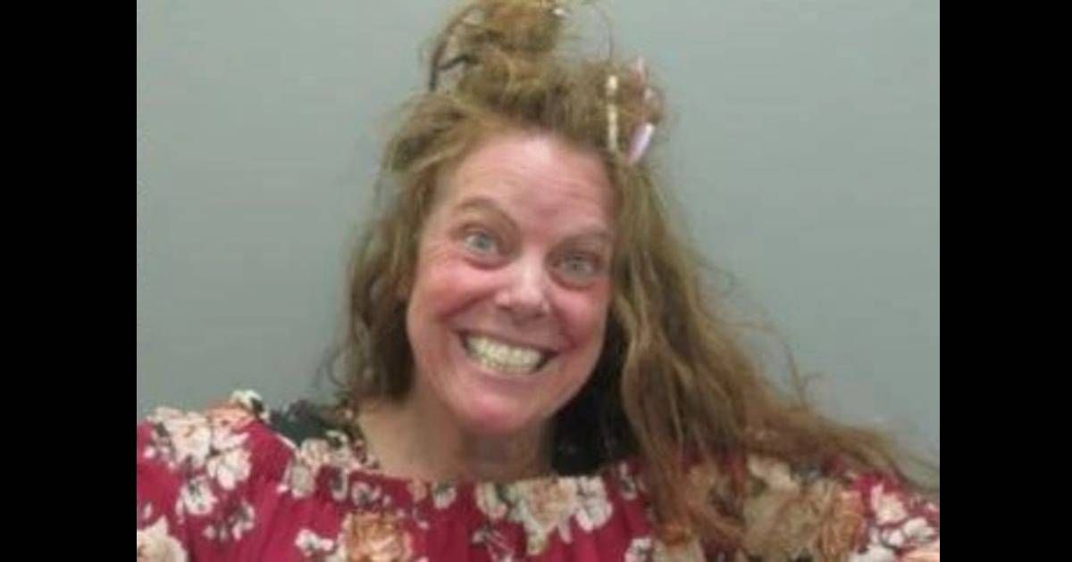 Michelle Young first told police her friend lived in the house and then confessed to setting the porch on fire (Burlington, Iowa Police Department)