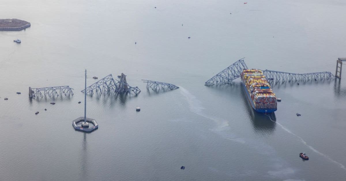 In an aerial view, the cargo ship Dali sits in the water after running into and collapsing the Francis Scott Key Bridge on March 26, 2024 in Baltimore, Maryland (Getty Images)