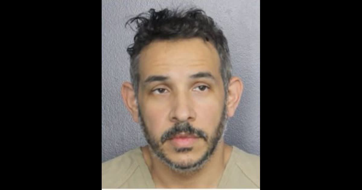 Jean Carlos Aponte fatally stabbed his wife and child before attempting to end his own life (Broward County Jail)
