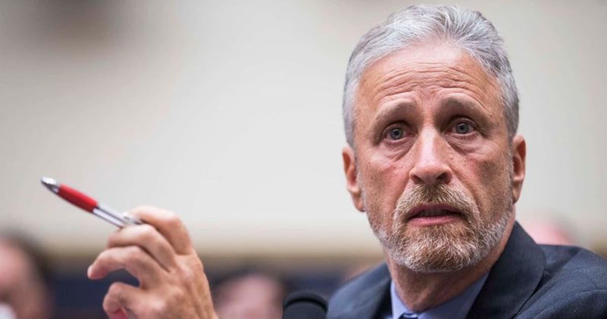 Jon Stewart questions the lofty promises of tech CEOs regarding artificial intelligence's potential to tackle major issues like climate change and disease (Getty Images)