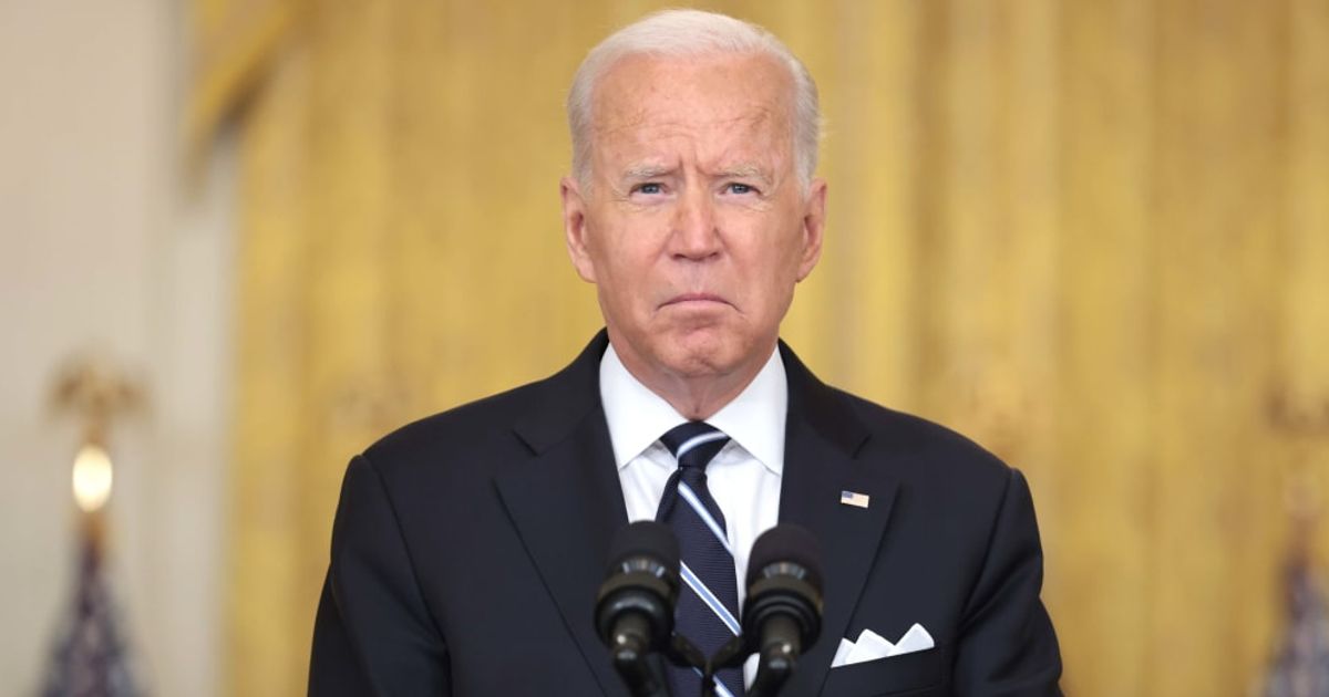 President Joe Biden appeared in the White House healthcare event alongside Senator Bernie Sanders with apparent CPAP markings visible on his face (Getty Images)