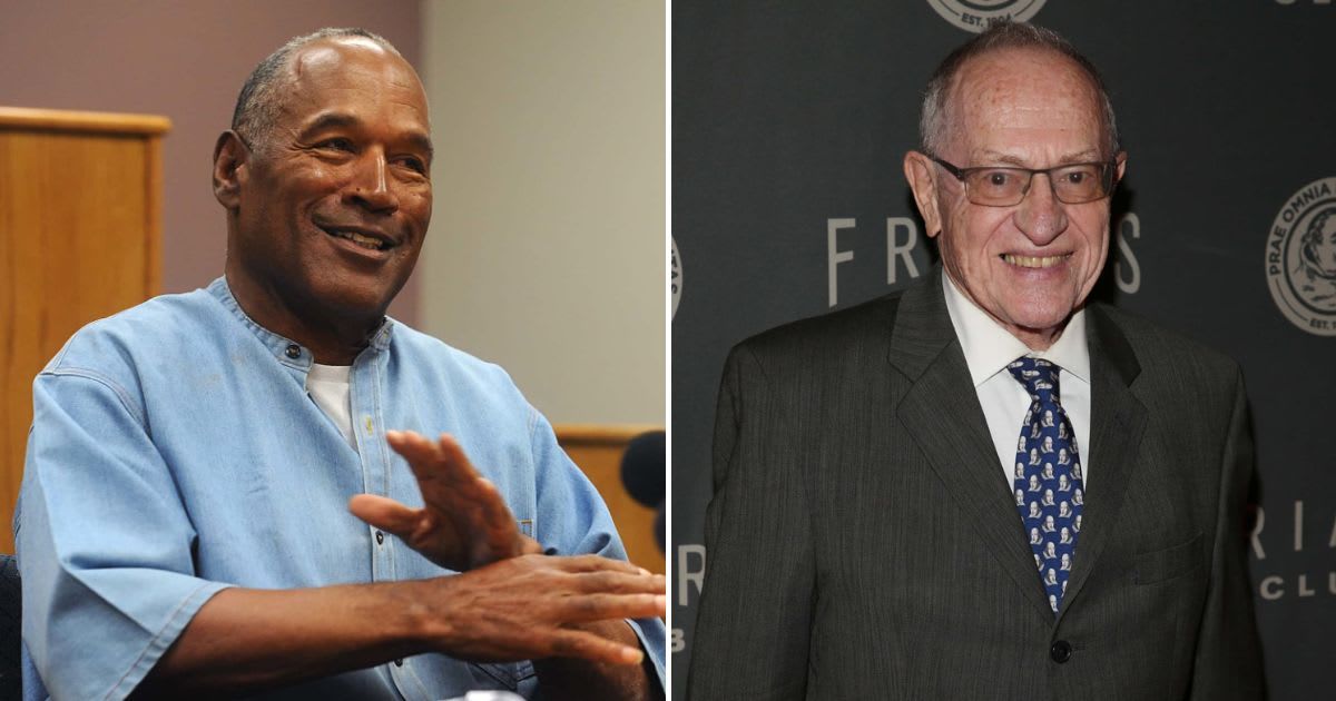 OJ Simpson lawyer Alan Dershowitz (R) reacts to the death of former NFL star and dual murder suspect (Getty Images)