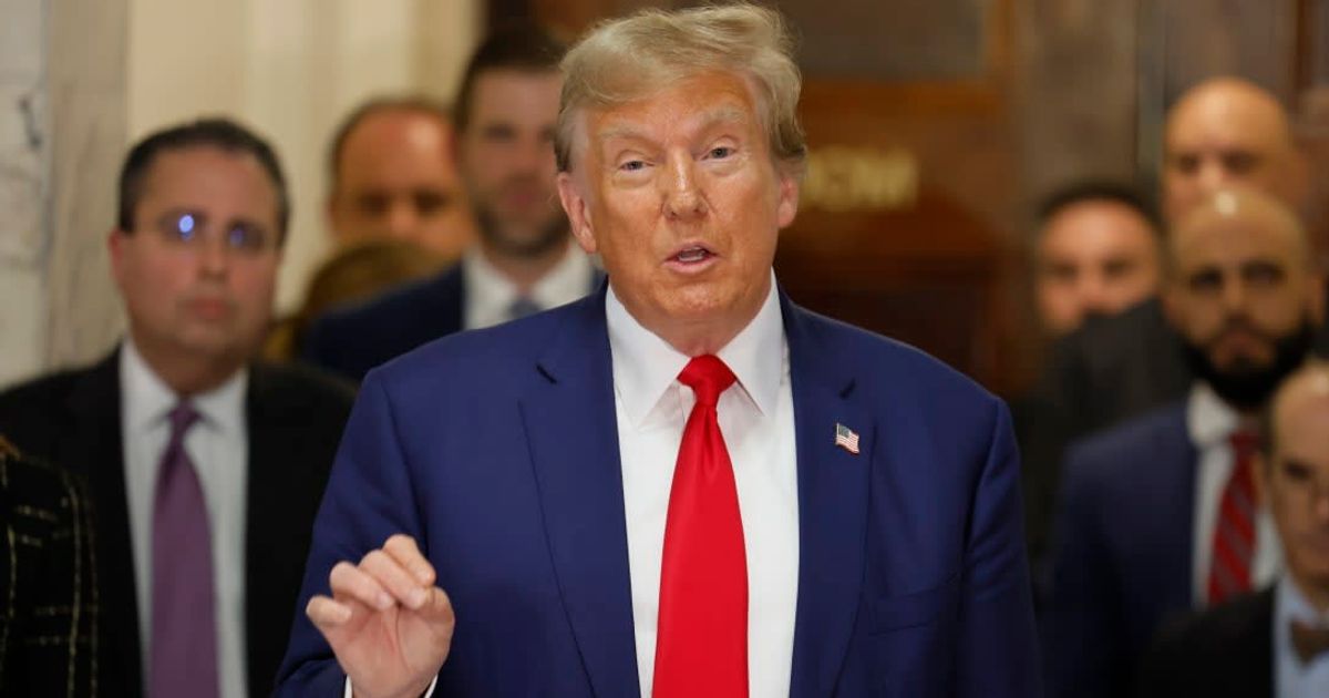 Former President Donald Trump addressed reporters outside the New York courtroom with a giant stack of new stories as a means to defend himself amid his ongoing hush money criminal trial (Getty Images)