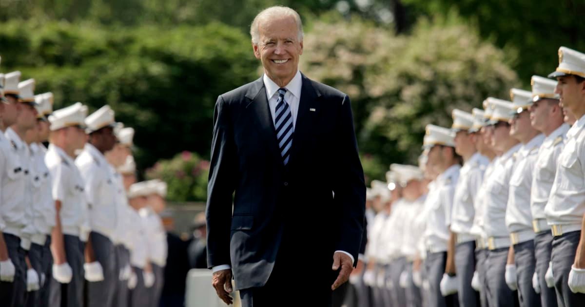 Joe Biden's top White House aides are now surrounding him as he walks to Marine One, so it draws less attention to his stiff walk (Getty Images)