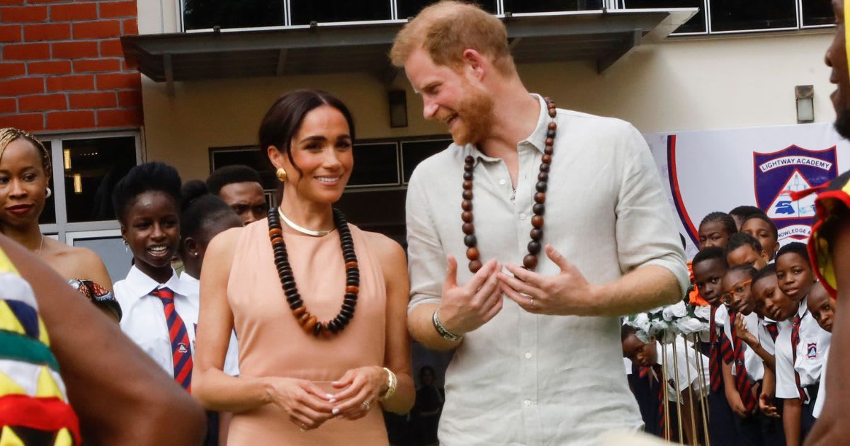 People pointed out a connection between the name of Meghan Markle's blush pink Heidi Merrick dress and the House of Windsor (Andre Esiebo/Getty Images for The Archewell Foundation)