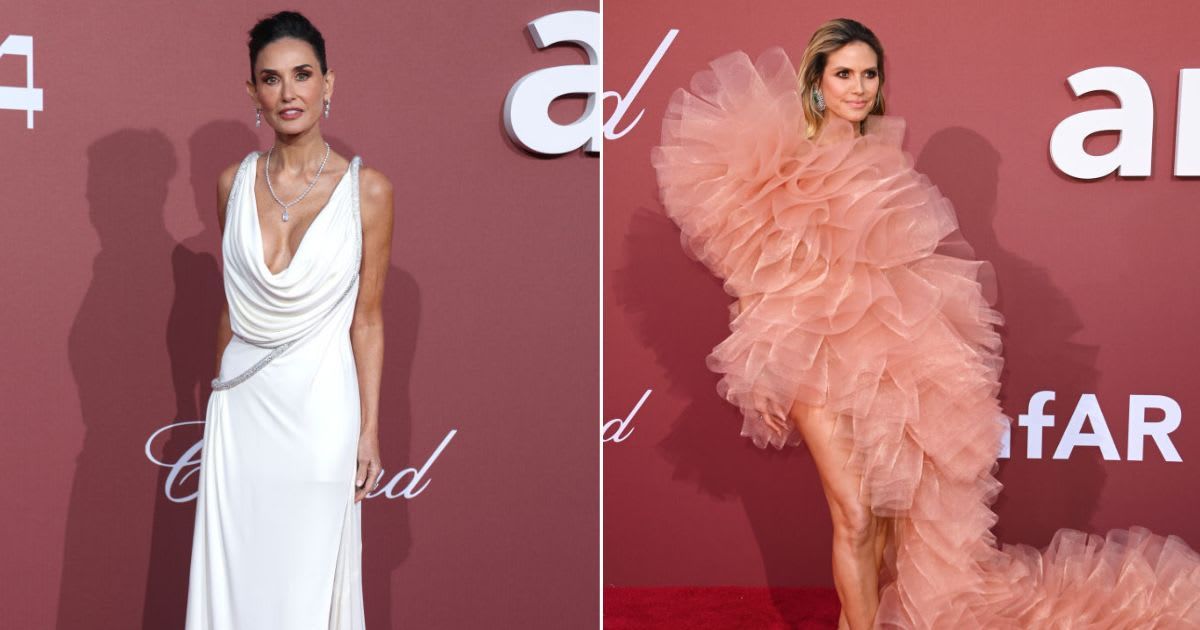 Demi Moore (L) and Heidi Klum at the amfAR Gala red carpet (Mike Marsland/WireImage, Eamonn M McCormack/Getty Images)