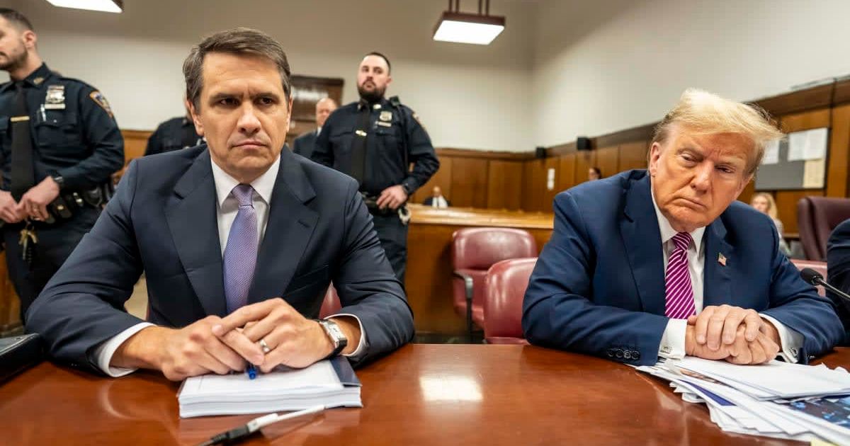 Donald Trump (R) sits with his attorney Todd Blanche (L) during his criminal trial as jury selection continues at Manhattan Criminal Court on April 19, 2024 in New York City (GettyImages)
