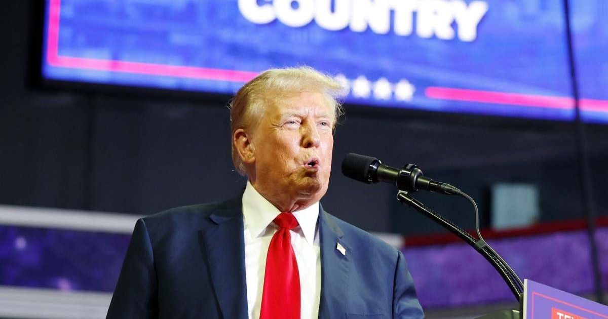 Former President Donald Trump boosted a social media post featuring a rallying cry of QAnon (Anna Moneymaker/Getty Images)