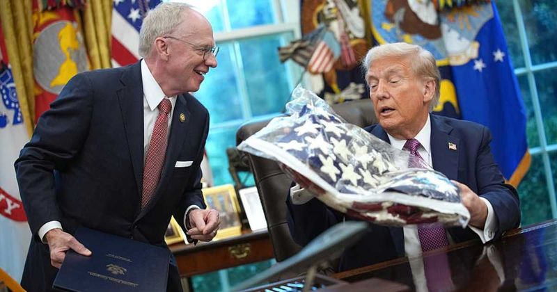 Trump mistakes American flag for blanket in awkward Oval Office moment: 'I could use that at night'