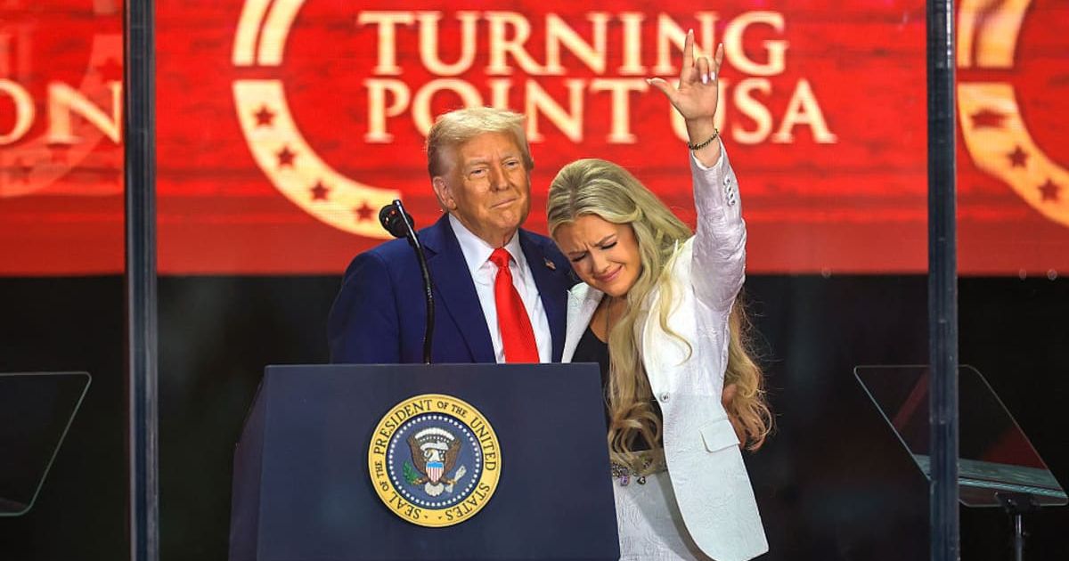 Erika Kirk joins Donald Trump onstage during the memorial service for Charlie Kirk on September 21, 2025, in Glendale, Arizona (Joe Raedle/Getty Images)