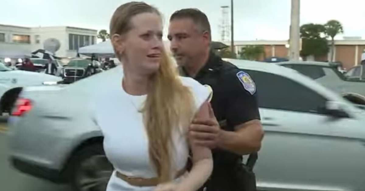 Sara Routh, the daughter of Ryan Routh ran after an SUV when her father was taken away after the verdict. Police removed her from the spot (YouTube screengrab KWTX News 10)