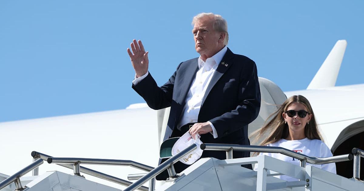 Donald Trump walked off Air Force One with his granddaughter, Kai Trump, after arriving in Farmingdale, New York, on September 26, 2025 (Getty Images)