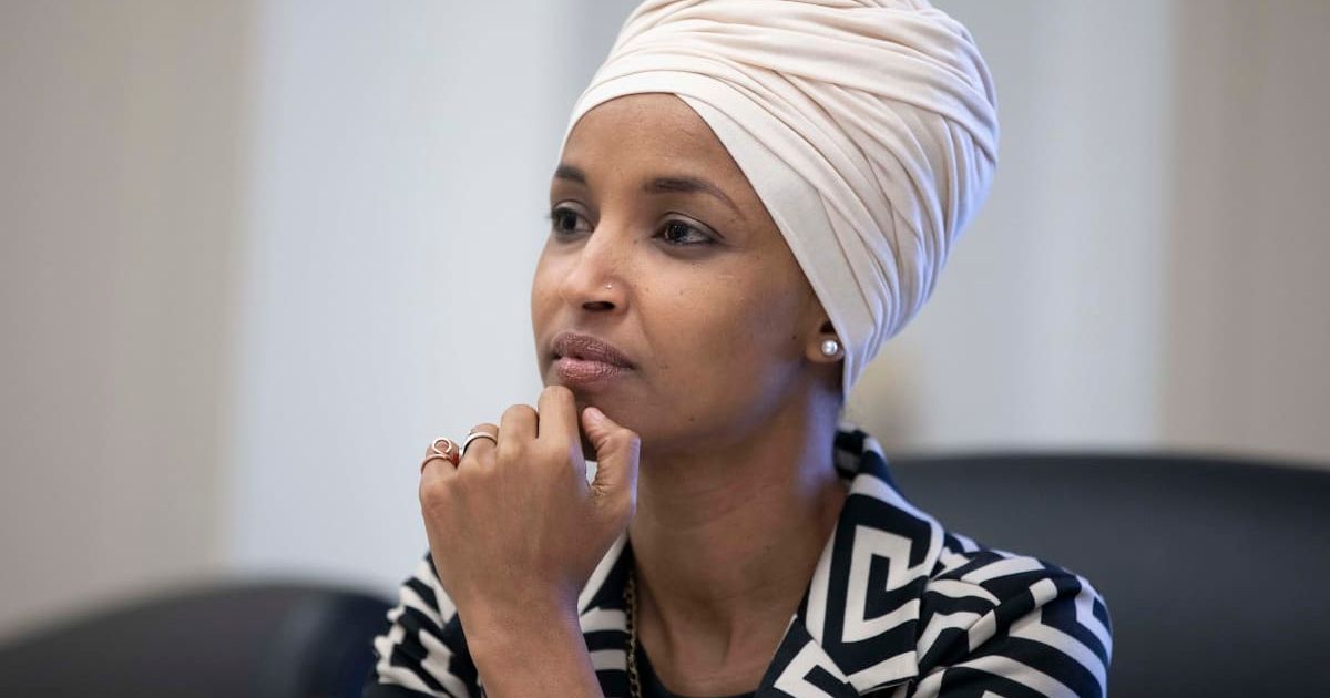 Ilhan Omar laughed while responding to Donald Trump’s Somalia remark during a press interaction in Washington DC (Getty Images)