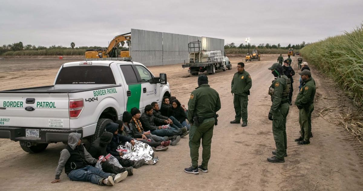 US Border Patrol agents detain undocumented immigrants caught near the Rio Grande Valley (Getty Images)