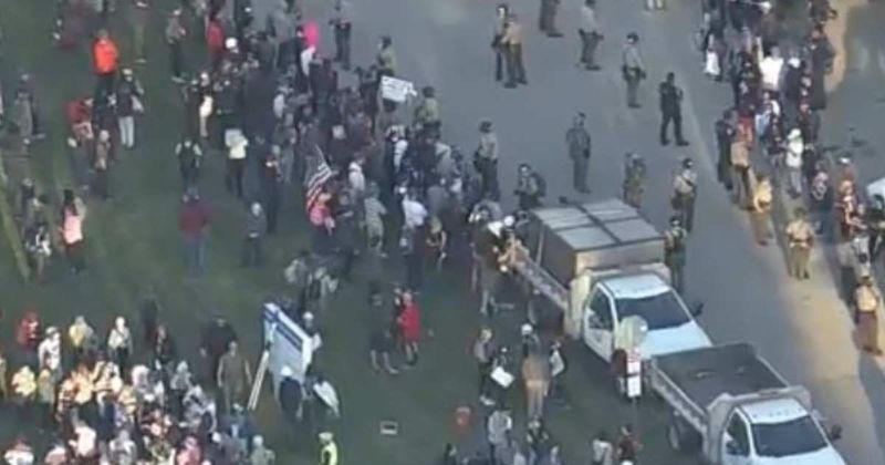 ICE agents ‘boxed in by 10 cars’ amid escalating tensions in Chicago suburb