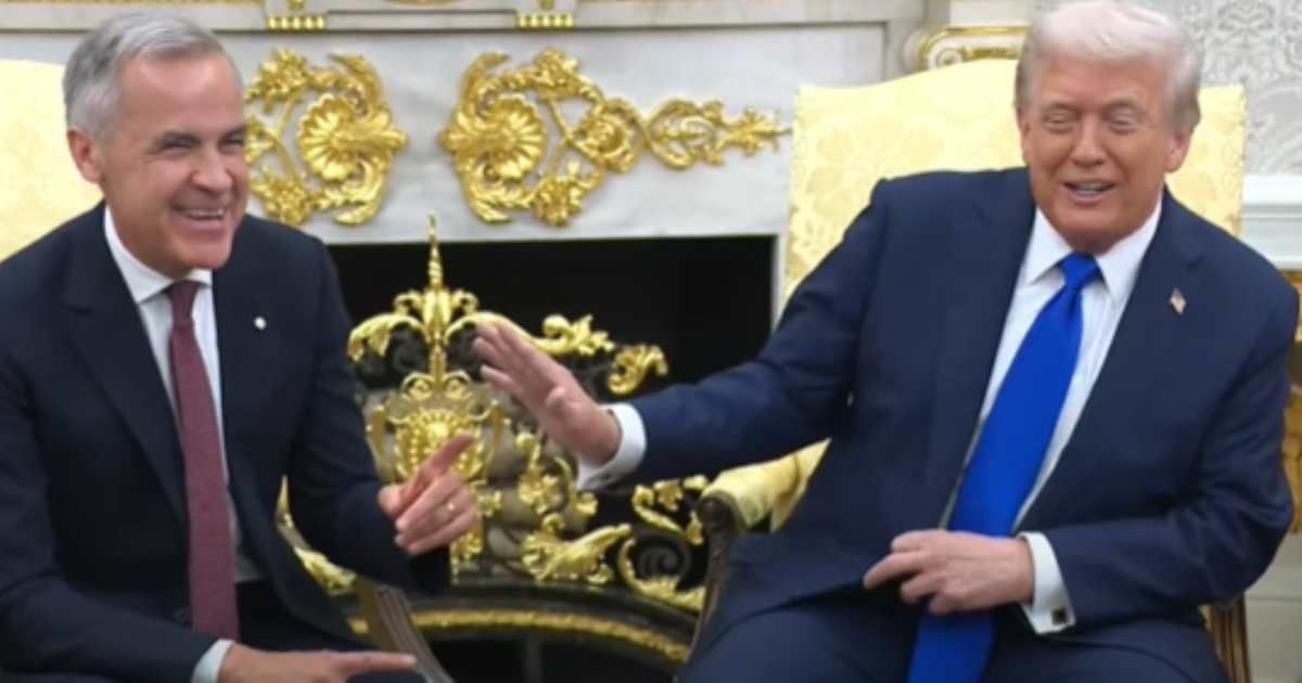 Canadian Prime Minister Mark Carney was caught off guard when President Donald Trump joked about a 'merger of Canada and the United States' (White House/Youtube)