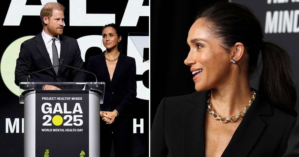 Meghan Markle turned heads in a sleek black Armani suit while holding hands with Prince Harry at the 'Project Healthy Minds Gala' in NYC (Getty Images)