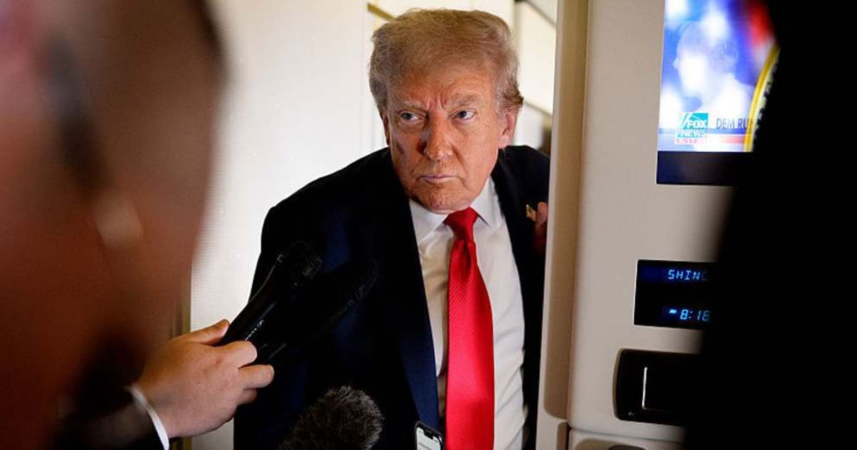 White House press secretary Karoline Leavitt posted a photo from inside Air Force One showing Donald Trump watching a live coverage of the event (Andrew Harnik/Getty Images)