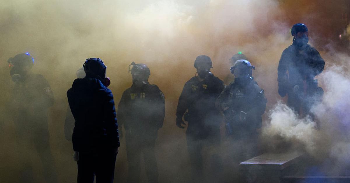 Anti-ICE protesters clash with federal agents at the Immigration and Customs Enforcement building on October 18, 2025, in Portland, Oregon (Getty Images)