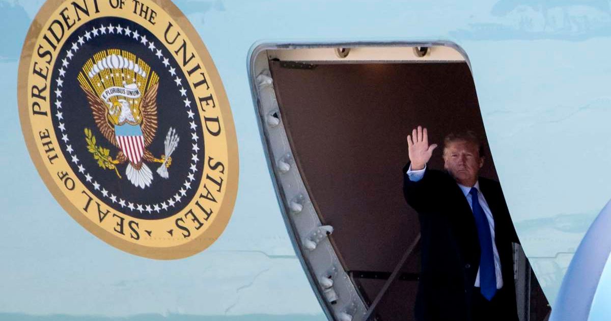Donald Trump boarded Air Force One using a small ramp after a suspected sniper stand was found near the landing area (Donald Kevin Dietsch-Pool/Getty Images)