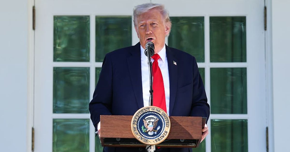 Donald Trump addressed reporters in the Oval Office after denying reports he sought $230M from the DOJ (Getty Images)