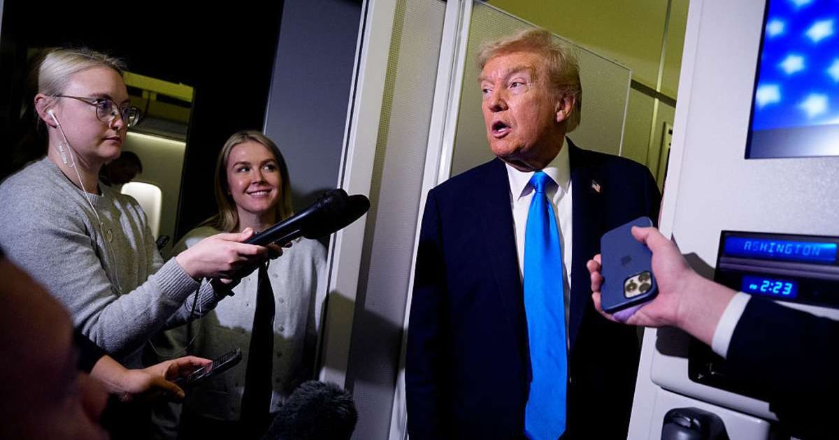 President Donald Trump spoke to reporters after meeting Qatar’s Emir aboard Air Force One (Andrew Harnik/Getty Images)