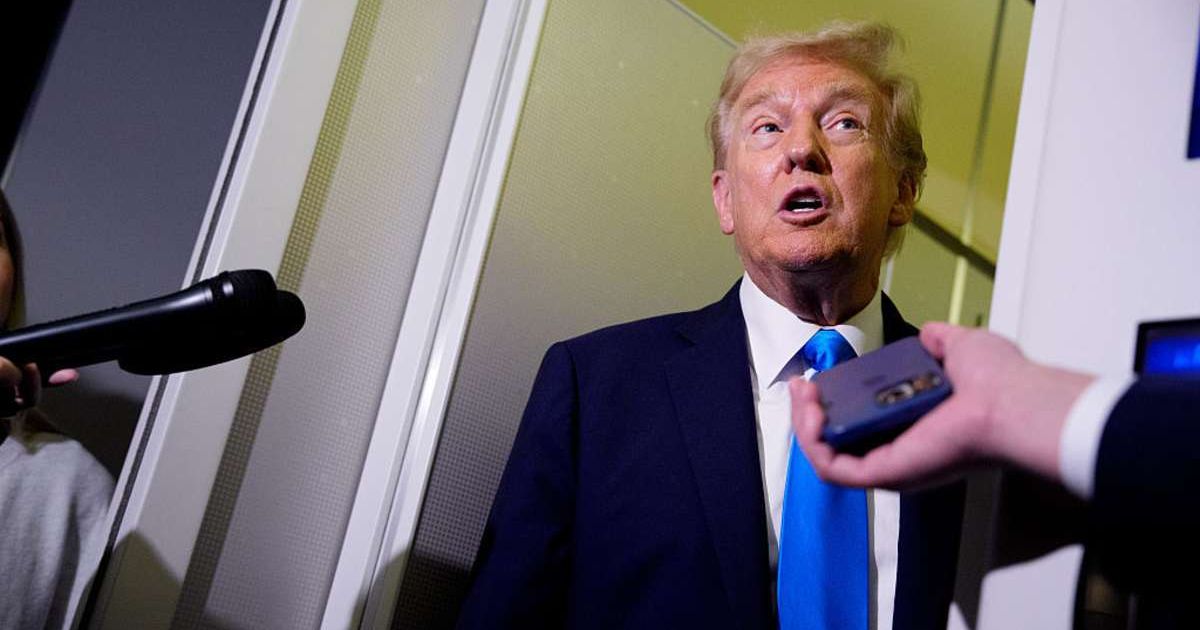 Donald Trump said he is willing to negotiate with Democrats to make Obamacare 'better' while speaking to reporters aboard Air Force One en route to Asia (Getty Images)