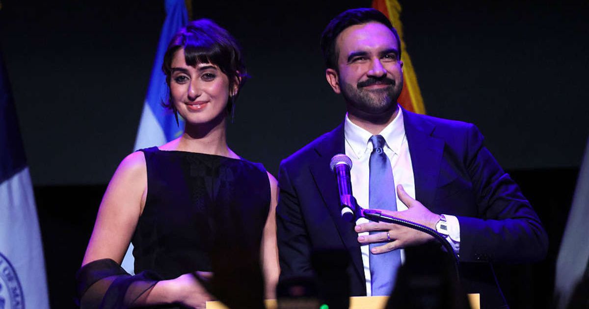 Zohran Mamdani stood with his wife Rama Duwaji after delivering remarks at his Brooklyn election night celebration (Getty Images)