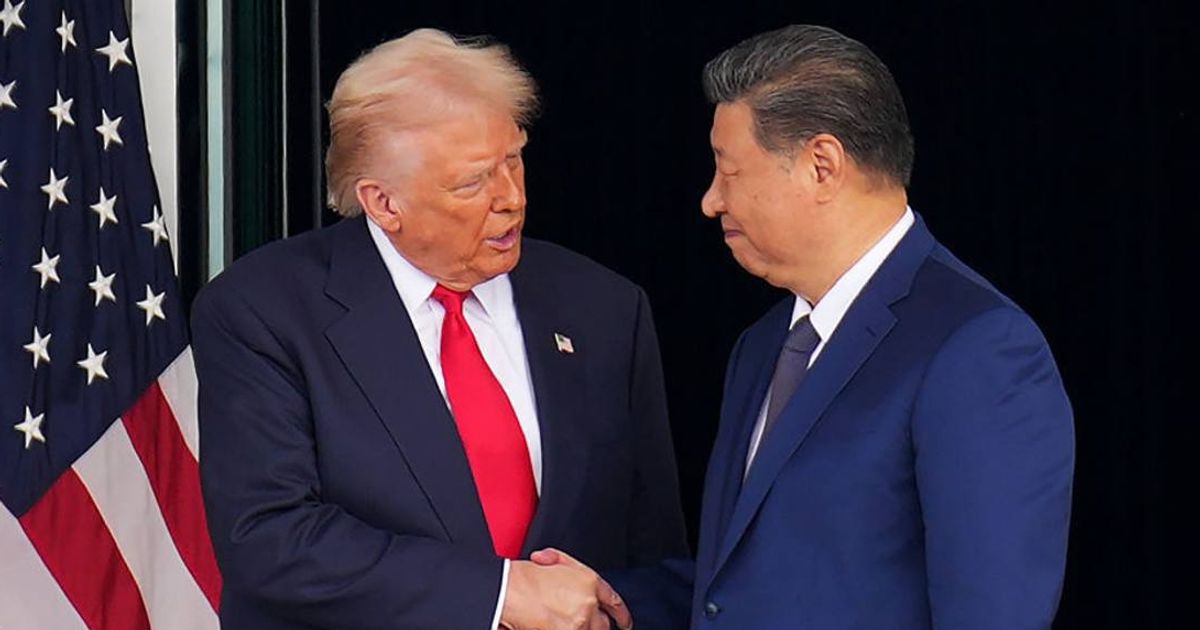 US President Donald Trump and Chinese President Xi Jinping shake hands as they depart following a bilateral meeting at Gimhae Air Base on October 30, 2025, in Busan, South Korea (Getty Images)