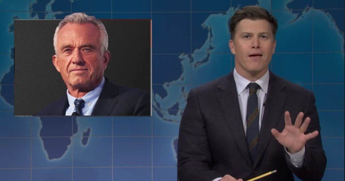 Colin Jost mocked Robert F Kennedy Jr's reaction to a pharmaceutical executive fainting in the Oval Office on 'Saturday Night Live' (Saturday Night Live/YouTube)