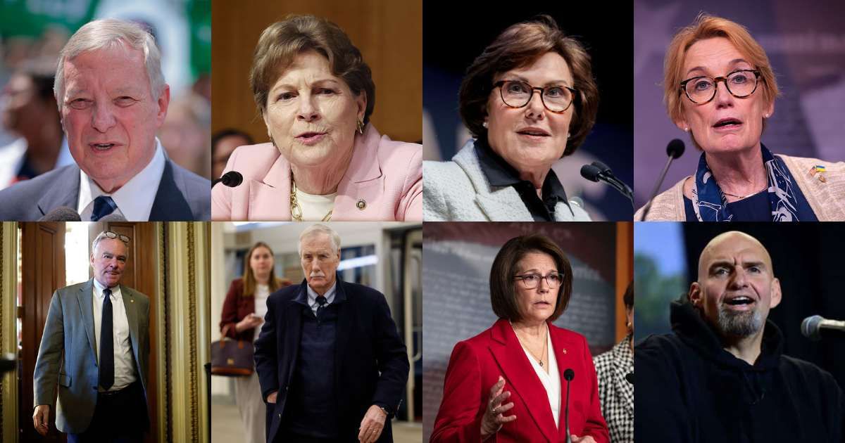 The eight Senate Democratic Caucus members who voted to end the shutdown stood together after the vote (Getty Images)