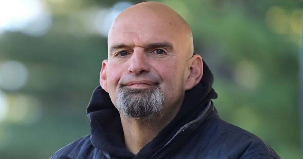 John Fetterman showed the stitched injury on his cheek in a recovery photo he shared online (Getty Images, Wikimedia Commons)