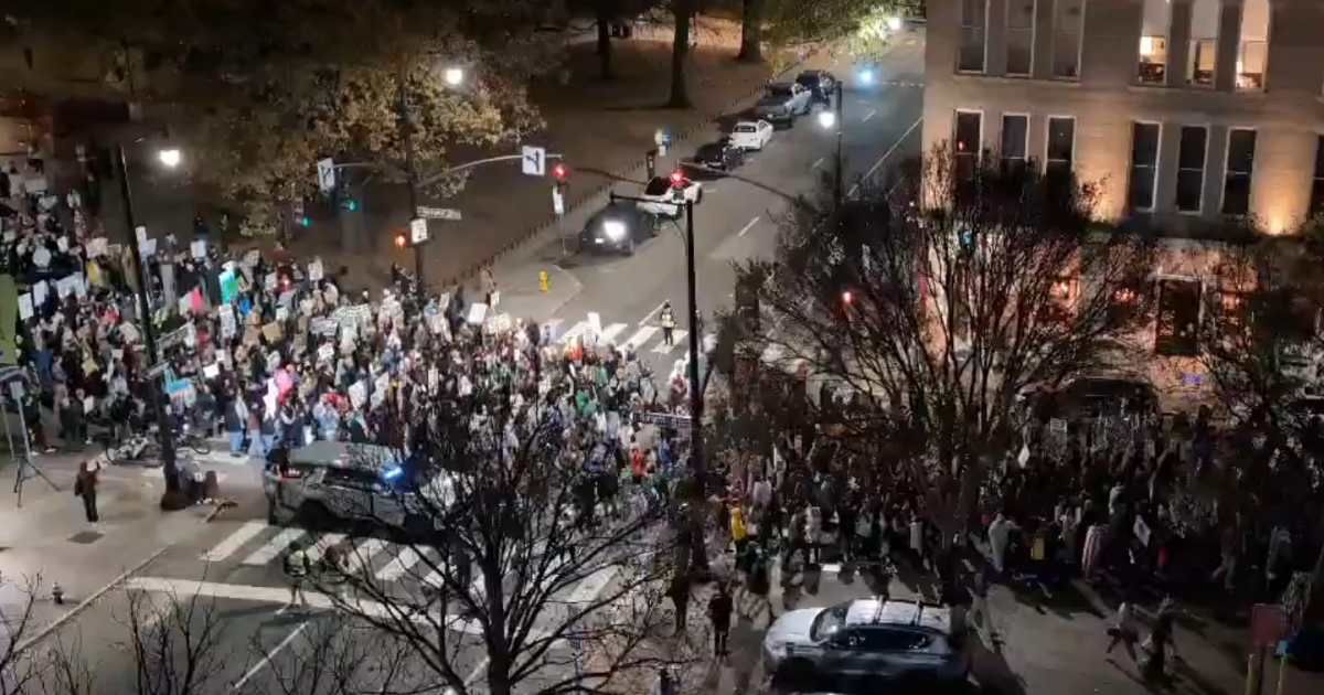Immigration rights groups said federal agents detained 12 Triangle residents as protesters in Raleigh, Durham, and Cary chanted against Immigration and Customs Enforcement (@stephenehorn/X)