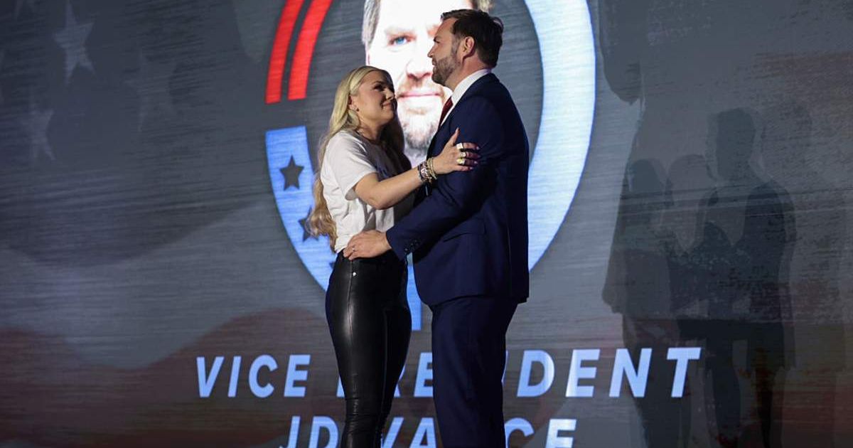  Erika Kirk, widow of the late Charlie Kirk, and US Vice President JD Vance embrace on stage during a Turning Point USA event at the Pavilion at Ole Miss at the University of Mississippi (Getty Images)