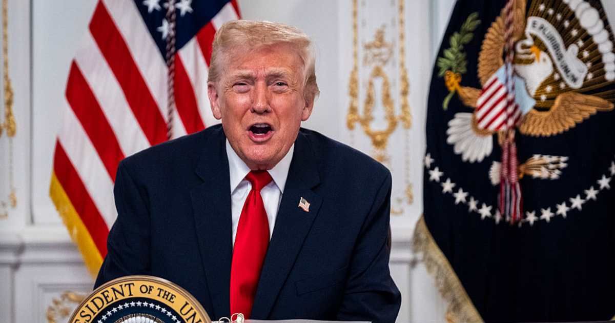 President Donald Trump participates in a call with US service members from his Mar-a-Lago club in Florida on Thanksgiving Day on November 27, 2025, in Palm Beach, Florida (Getty Images)