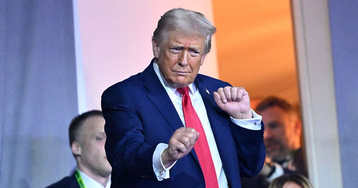 President Donald Trump dances to the final performance of the Village People during the FIFA World Cup 2026 Official Draw at John F Kennedy Center for the Performing Arts on December 05, 2025 in Washington, DC (Mandel NGAN - Pool/Getty Images)