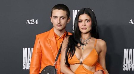 Kylie Jenner and Timothee Chalamet pack on PDA in matching outfits at ‘Marty Supreme’ premiere