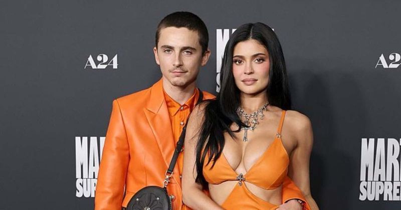 Kylie Jenner and Timothee Chalamet pack on PDA in matching outfits at ‘Marty Supreme’ premiere